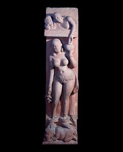 Damsel Mounting on a Dwarf, Holding a Grape and a Jug of Wine (Red Sandstone Sculpture, Kushan Empire)