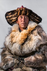 A portrait of a Kazakh eagle hunter in western Mongolia
