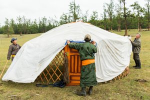 Local people constructing a ger, a portable yurt near Lake Khövsgöl in northern Mongolia
