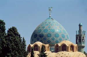 Turquoise tiled dome of the Mausoleum of Shah Nematollah Vali