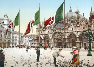 Feeding the pigeons in St Marks Square, Venice by Italian Photographer