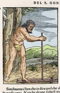 A native man lighting a fire by rubbing two pieces of wood. Engraving from 