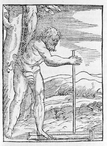 An Indian Tainos lighting a fire by rubbing two pieces of wood. Engraving from 