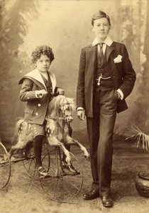 Young Boy on His Horse Mounted as a Tricycle, His Older Brother Alongside, 1880s by J. H. Killick