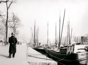 Policeman by a canal, Rotterdam by James Batkin