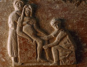 A relief from the tomb of a Roman man and wife shows a woman giving birth. Museo Archeologico. by James L Stanfield