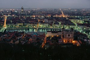 A view of Lyon between the Pont de la Feuillite, the Pont Bonaparte at twilight by James L Stanfield