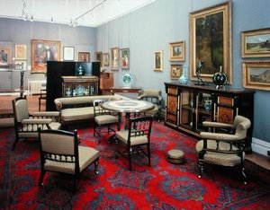 Suite comprising a cabinet centre table sofa pair of side