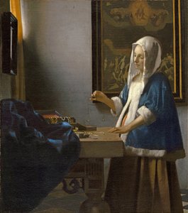 Woman Holding a Balance