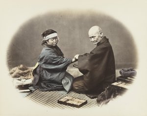 Japanese man and woman in traditional dress by Japanese Photographer