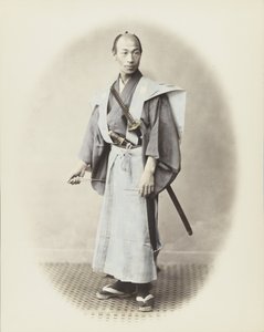 Japanese man with sword by Japanese Photographer