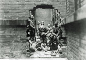 Japanese soldiers are involved in street fighting in Shanghai, China by Japanese Photographer