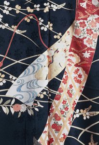 Kimono Furisode (billowing sleeves) worn by young unmarried women on elegant occasions and Maiko (Geisha student), Silk with floral and plant motifs, floating panels, detail, Kaga-Yuzen dyeing, Tokamachi weaving mills, Japanese civilization, 20th century by Japanese School