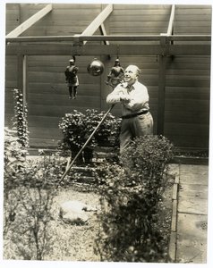 Tony Sarg in his garden