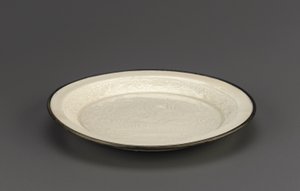 Ding ware dish with moulded decoration of mandarin ducks, Hebei province, 12th-13th century