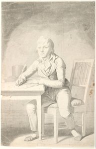 Young Boy Writing at a Table