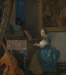 A Young Woman Seated at a Virginal