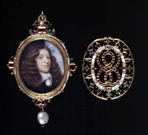 Miniature of an unknown man, in a gold and jewelled frame and cover by John (attr. to) Hoskins