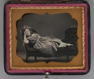 Untitled portrait of a girl reclining on a chaise longue