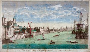 View of the Tower of London with boats on the River Thames