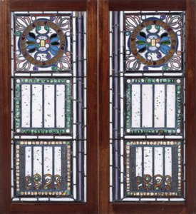 A pair of leaded glass windows by John La Farge or Lafarge
