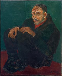 Man Crouching in a Dark Suit