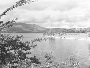 A view across Crummock Water with fells in the background by Joseph Hardman