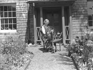 Spinner with Spinning Wheel at Tilberthwaite by Joseph Hardman