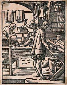 A tailor cutting cloth with scissors while his colleagues sew at a bench. Woodcut by J. Amman. by Jost Amman