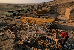 Urkesh, Hurrian Empire, Syria, 2400 BC, Giorgio Buccellati, covering excavations mudbrick walls, 2004 by Kenneth Garrett
