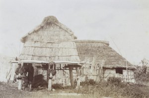 Ainu Storehouse with Ainu Children, c.1890s by Kenzô Tamoto