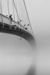 Man on Misty Bridge by Krunoslav Nevistic