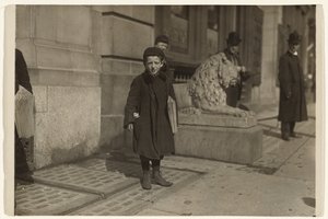 Newsboy by Lewis W. Hine