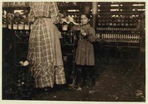 Fannie, 48 Inches High, Aged 7, One of 19 Children Helping Her Sister in Elk Mills, Fayetteville, Tennessee, 1910 by Lewis Wickes Hine