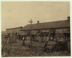 Housing for about 50 employees of Maggioni Canning Co., Port Royal, South Carolina, surrounded by marsh and on an old shell pile, 1912 by Lewis Wickes Hine