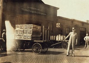 Men in Front of a Wells Fargo and Co Express Depot with Crates and Milk Cans, Springfield, Missouri, 1916
