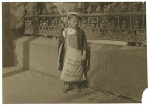 Newsboy Freddie Kafer, 5 or 6 Years Old, Selling Saturday Evening Posts at the Entrance to the State Capitol, Sacramento, California, 1915 by Lewis Wickes Hine