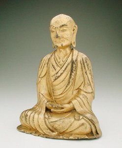 Figure of a seated lohan by Liao Dynasty Chinese School