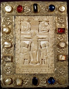 Archaeology of the Middle Ages. Barbarian art of Lombardy: the peace of Duke Orso. The ivory part represents Christ crucified surrounded by the Virgin, Saint Longinus the Centurion and Saint John. Lombard art of the 9th century.