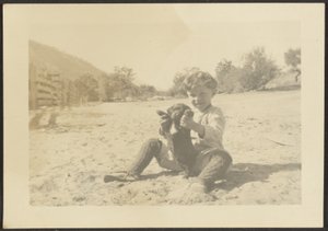 Boy and Dog on Beach by Louis Fleckenstein