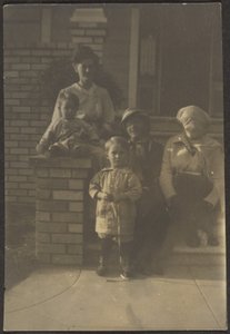 Family Portrait Outside House by Louis Fleckenstein