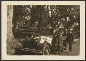 Figures at a Car with Flags by Louis Fleckenstein
