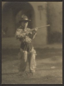 Little Boy in Cowboy Outfit