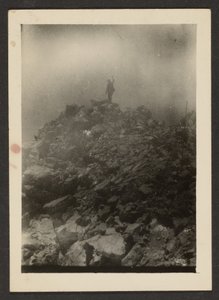 Man Atop Rock Pile by Louis Fleckenstein