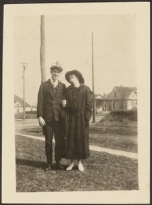 Man and Woman on Sidewalk by Louis Fleckenstein