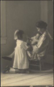 Mother in Rocker with Children