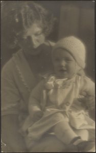 Portrait of Mother Holding Baby in Lap
