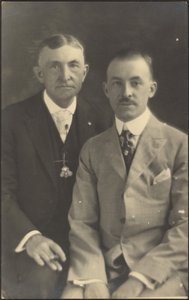 Portrait of Two Men with Suit Accessories by Louis Fleckenstein