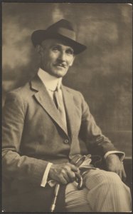 Portrait of a Man Holding Cane and Gloves