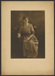 Portrait of a Seated Woman in Dress with Ribbon Accents